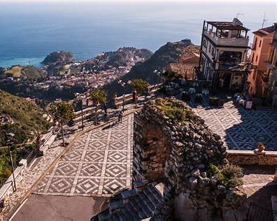 Full day cruise excursion linking Taormina Greek Theatre Castelmola terraces and Etna wineries