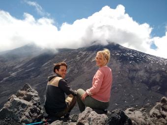 Mount Etna Hike, a couple enjoy a view of Mount Etna Craters.