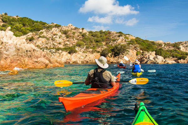 Sea kayaking experience near Taormina with bays and rocky coastline